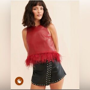 Black grommet asymmetrical leather style mini skirt s so fun year round
